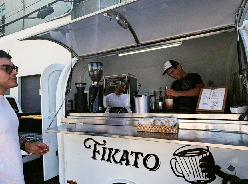Fikato coffee trailer with a barista preparing a drink in Tijuana